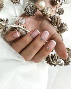 White manicure on the tips of the nails 2021