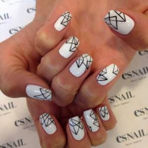 White manicure with geometric shapes