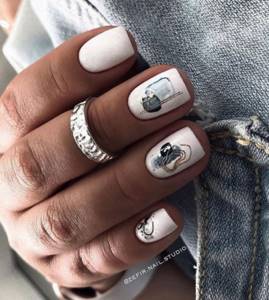 White manicure with nail sliders on square nails.