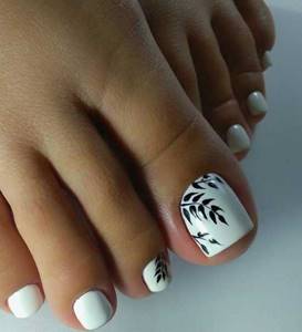 White pedicure with stickers