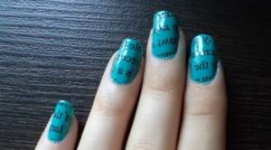 Turquoise manicure in newspaper style