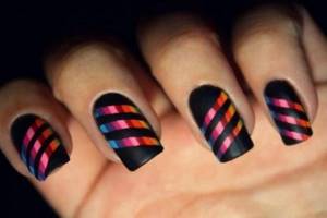 Noble design with stripes of manicure tape