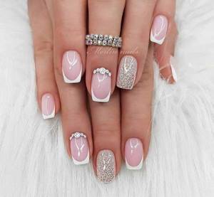 Sequins and rhinestones in a combined French manicure design