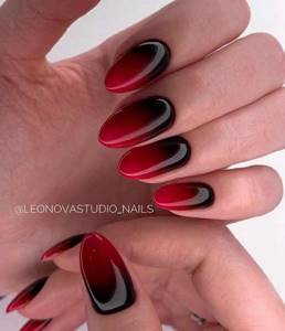 Burgundy-red gradient nail design