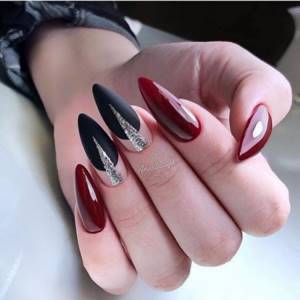 Burgundy nail design with black