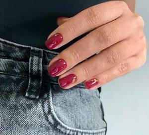Burgundy manicure with foil