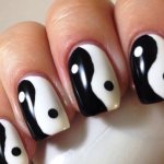 Black and white yin-yang manicure
