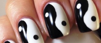 Black and white yin-yang manicure