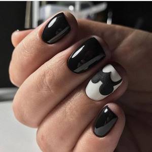 Black and white manicure with matte Mickey ears