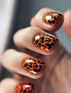 Black and orange manicure