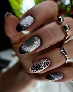 Black and silver cat eye manicure