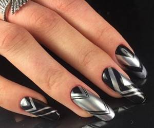 Black and silver manicure with rubbing