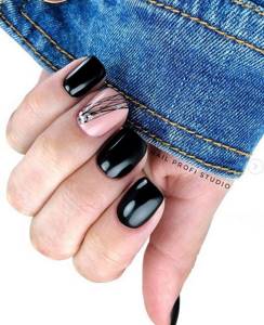 Black nail design with spider web