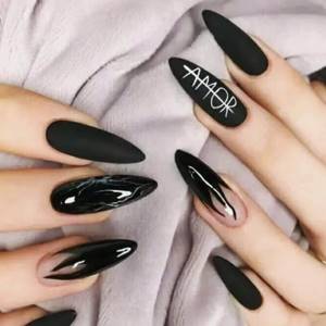 Black manicure with inscriptions