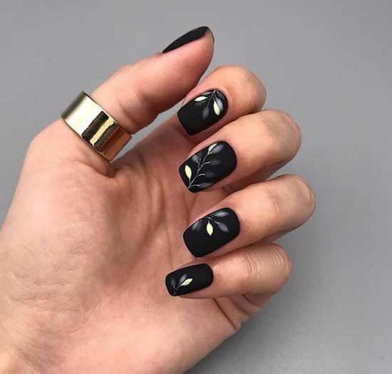 Black manicure with a pattern