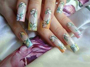 Long nail extensions decorated with floral print