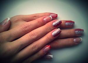 If the dress is decorated with rhinestones, then you can decorate your nails with them