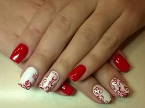 If the dress contains other colors and prints, then you can safely repeat them in manicure