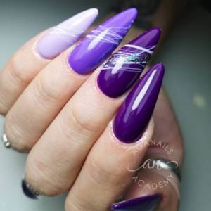 Purple design on long nails with abstract lines