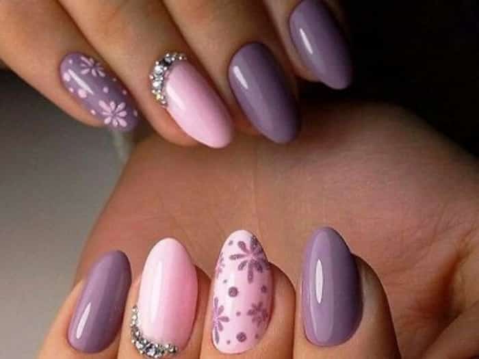 Purple nail polish with snowflakes