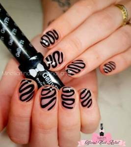 Photo with manicure design - black designs on nails