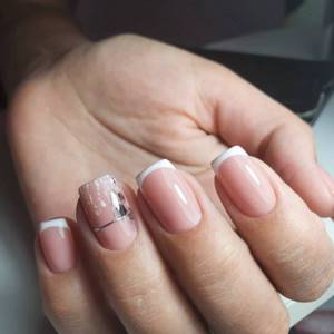 French manicure with gel polish with a pattern for short nails.