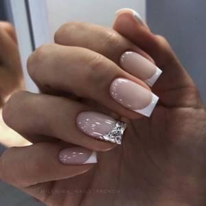 French manicure on sharp square nails using glitter.