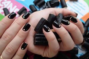 glossy dark manicure