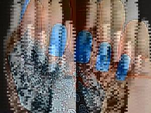 Blue background in manicure with snowflakes