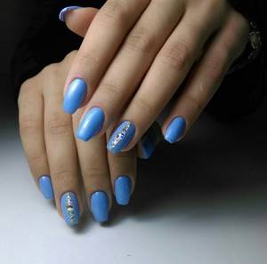 blue manicure with rhinestones