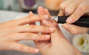 How to process side rollers with a router in a combined manicure