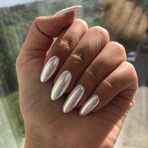 Classic white manicure with pearl rub