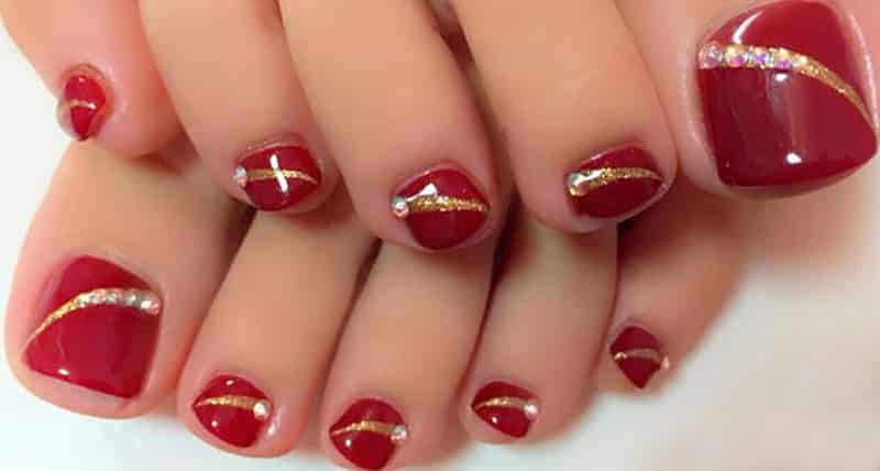 Red and gold pedicure