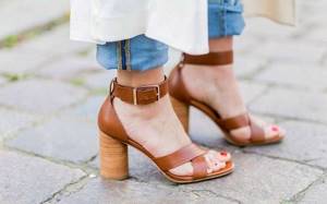 Red polish and brown sandals