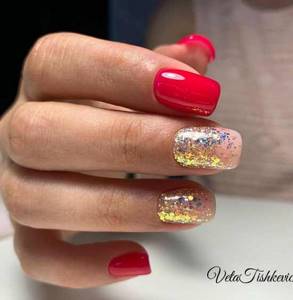 Red manicure with foil