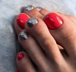 Red pedicure and foil