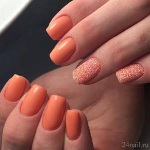 Salmon manicure with sand on one nail