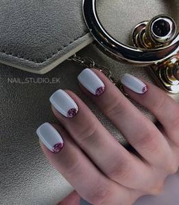 Lunar manicure on a white background