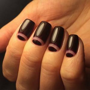 Lunar nail art in dark tones