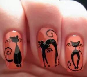 Manicure with cats with a brush