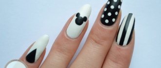 Manicure with Mickey Mouse, stripes and polka dots black and white