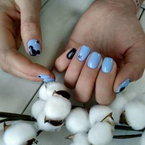 Manicure in blue tones with Mickey ears