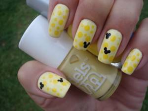 Manicure yellow and black design with Mickey ears