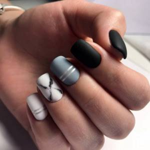 Matte finish for short nails. Black, gray tones in manicure. Marble manicure on short square nails. 