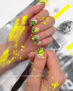 Matte nails with an abstract bright design.