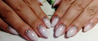 Milky manicure with rhinestones