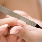 Can I use a nail file if my nails are covered with gel polish?