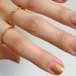 Unusual manicure with gold