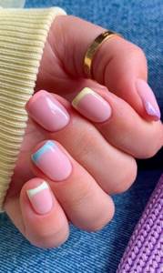 Delicate colored French manicure for short square nails.