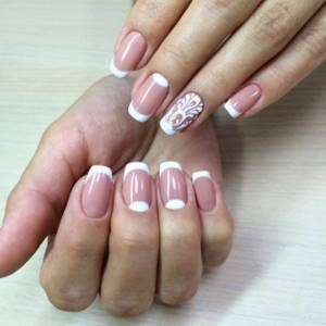 Delicate French manicure with simple monograms